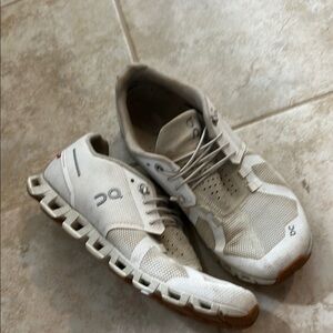 On Running White and Brown Athletic Shoes with Cloud Cushioning